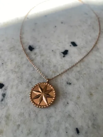 Collier doré pendentif étoile S.Steel