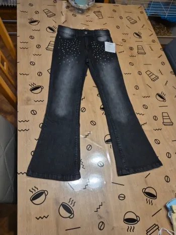 Jeans patte d éléphant a strass 11/12ans