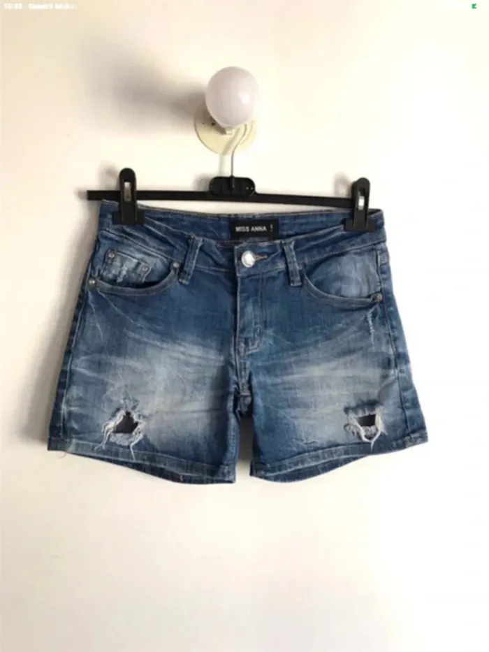 Short en jean troué Miss Anna taille 34/36