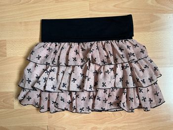 Jupe motif noeud rose pale