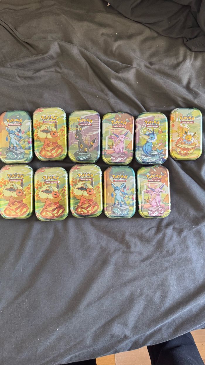 Lot de 11 mini tins évolution prismatique EV8.5 FR Pokémon