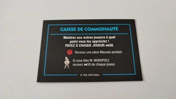 Carte caisse de communauté Payez M50 jeu de société Monopoly mauvais perdants Hasbro Gaming #B77