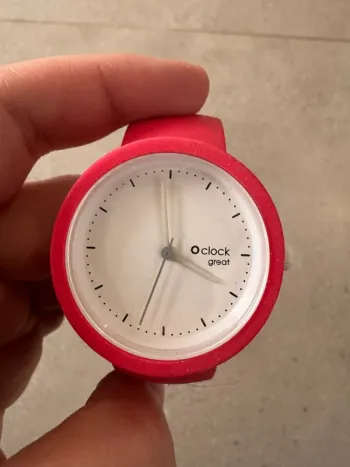 Montre rose O clock élastique, très bon état, pile à changer