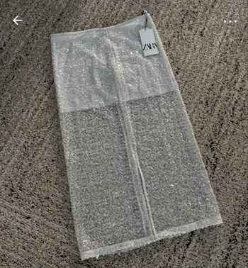 jupe transparante à paillettes