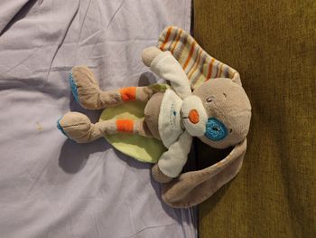 Doudou lapin œil bleu tex