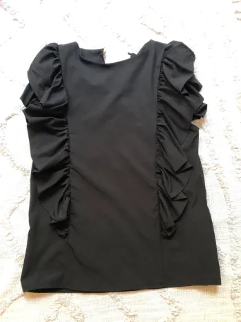 Blouse à volants taille 36 noir