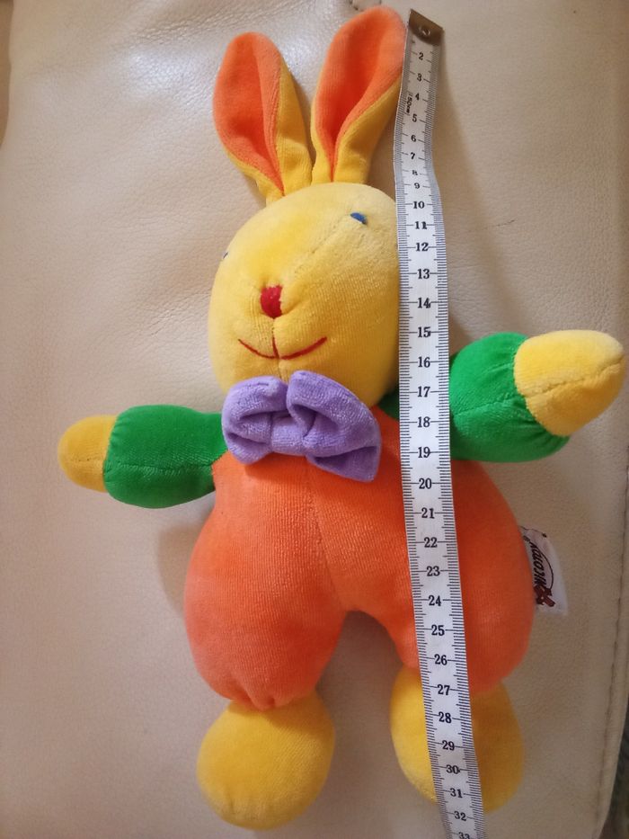 Doudou lapin jaune orange vintage d'occasion marque Nicotoy