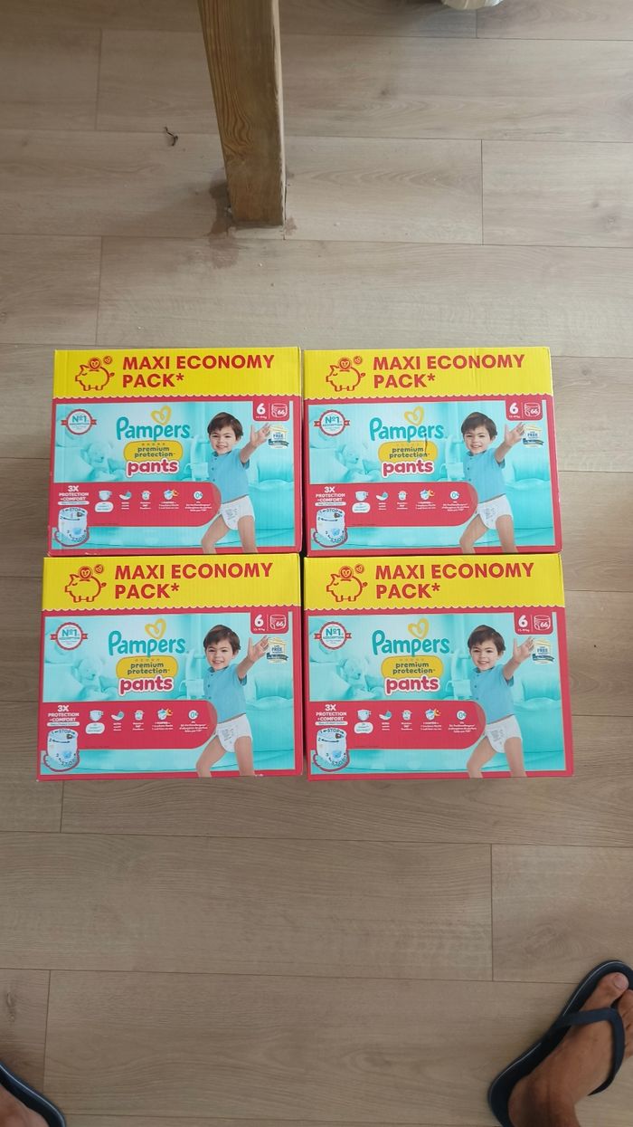4 maxis economy packs Pampers premium protection pants taille 6