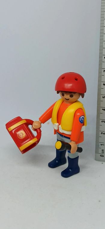 Homme secouriste avec gilet de sauvetage et casque playmobil