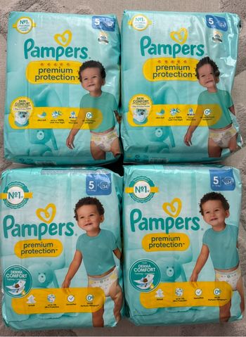 4 paquets de couches Pampers  taille 5