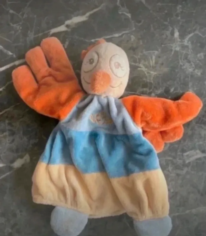 Doudou Marionnette Sissi Autruche Oiseau Noukie’s en très bon état.