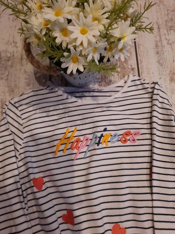 Haut à rayures manches longues et nœud