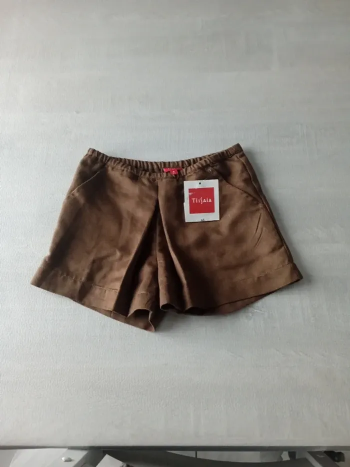 short neuf 4 ans