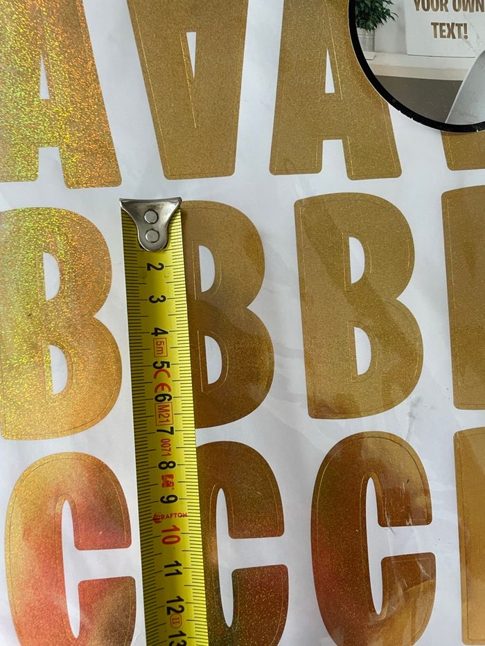 97 lettres dorées adhésives de 7 cm - photo numéro 2