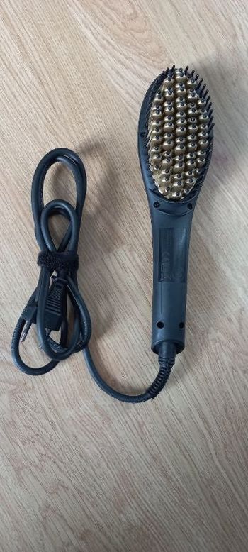 Brosse chauffante lissante