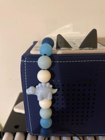 Cache poussière bleu dinosaure