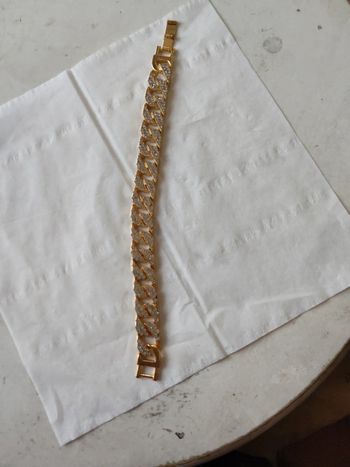 Bracelet doré avec le strass 21 cm