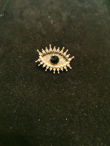 Broche œil doré et bleu
