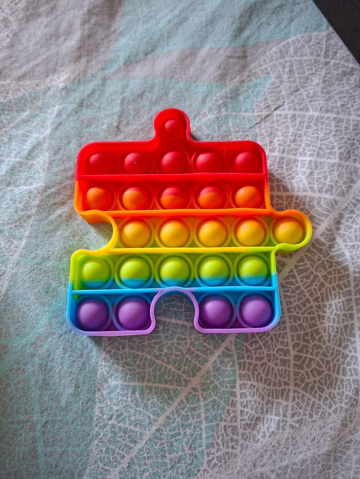 Pop-it pièce de puzzle