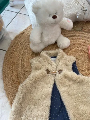 Veste sans manche moumoute