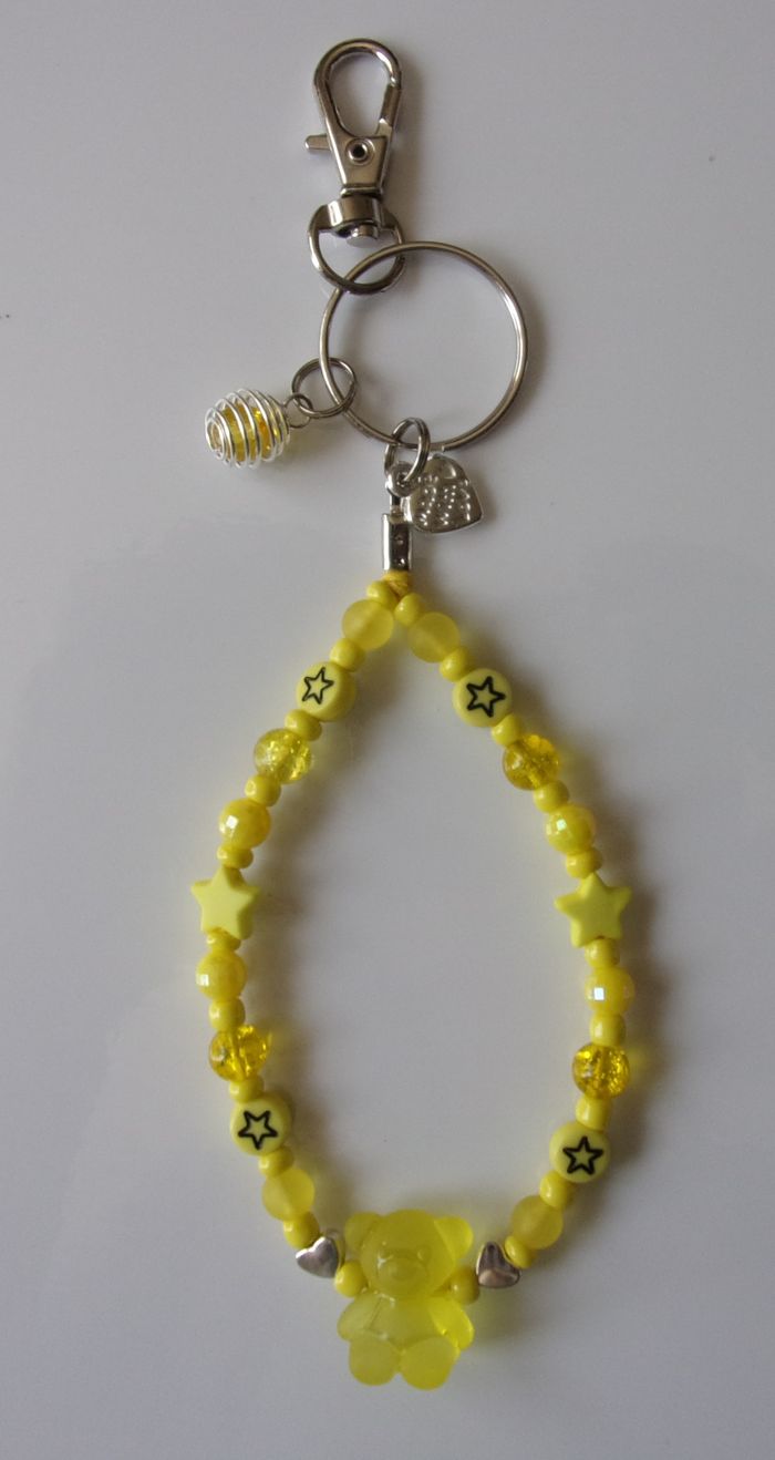Porte clé argenté ou Déco de sac à main ourson givré jaune