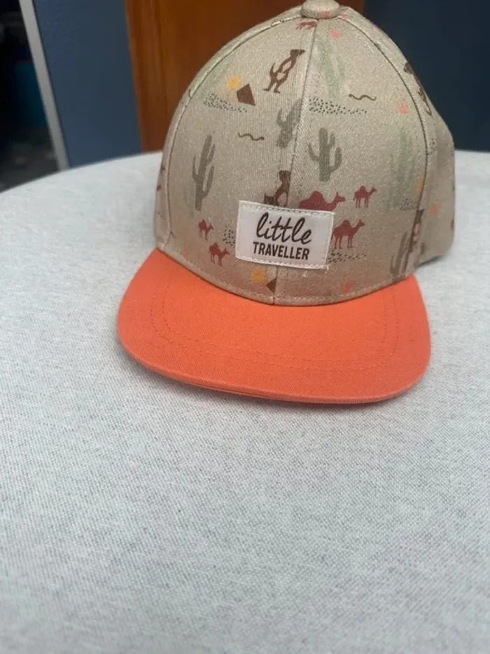 Casquette tape à l’œil orange et marron 9-18 mois