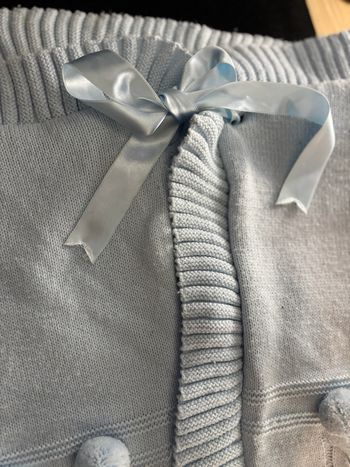 Nid d’ange avec noeud en satin