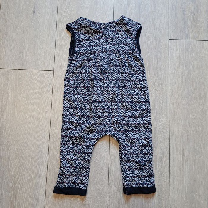 Salopette fluide noir clair, blanc et rouge. Fille 12 mois. Marque Kiabi