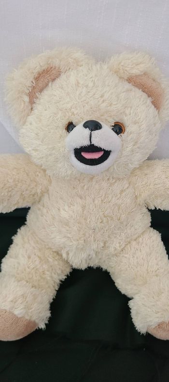 Peluche publicitaire ours CAJOLINE Assouplissant beige