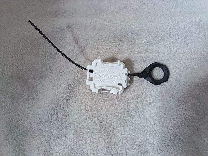 Lanceur Beyblade Burst Blanc Hasbro (2017) + Crémaillère - photo numéro 1