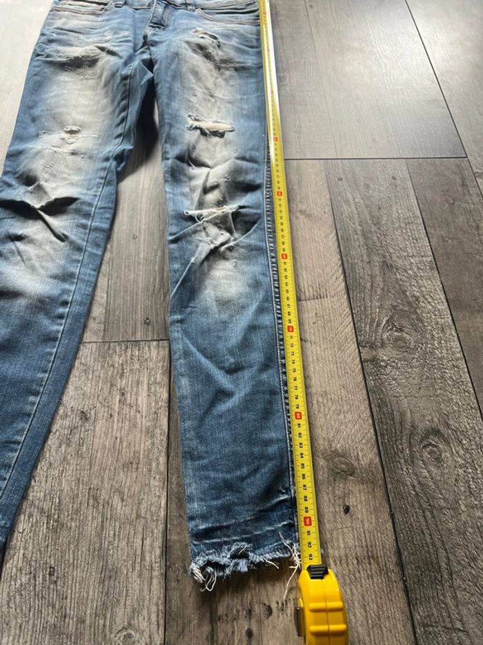 Jeans troués - photo numéro 3