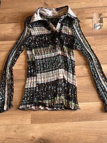 Je vend une chemise légère femme très bon état
