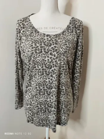 Jolie blouse Léopard taille M