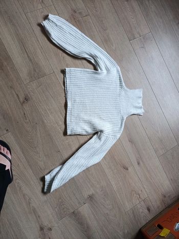 Pull col montant