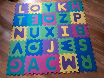 Tapis puzzle dalles en mousses 30x30cm