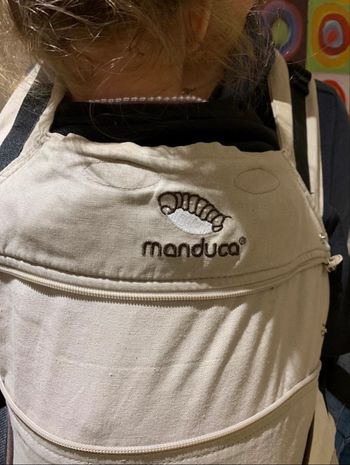 Porte bébé physiologique Manduca couleur sable avec boîte d’origine et notice en français