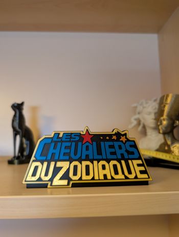 Enseigne les chevaliers du zodiaque
