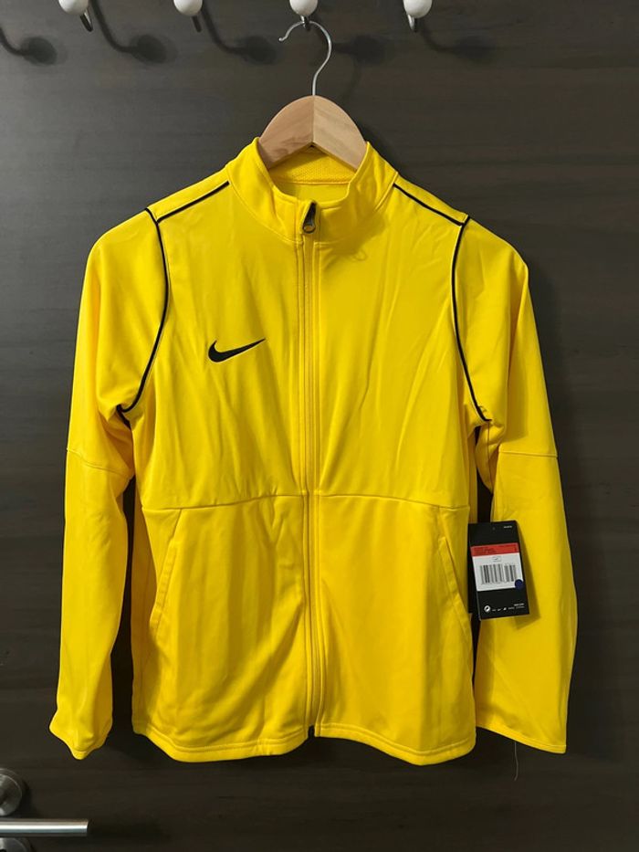 Haut de survêtement Nike enfant taille L