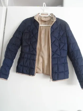 veste M