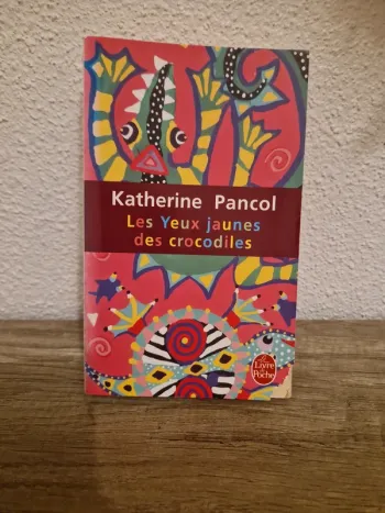 📚 livre les yeux jaunes des crocodiles