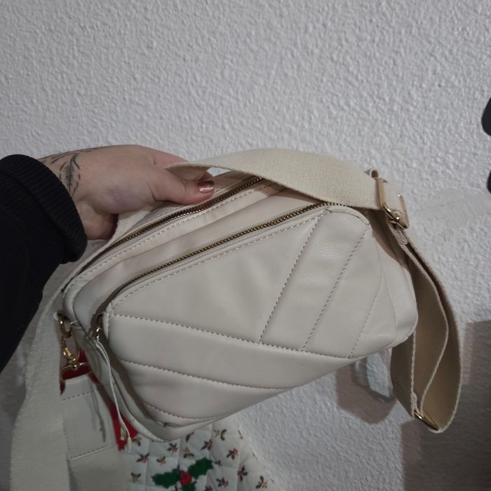 Sac bandoulière a poche blanc crème