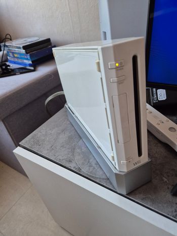 Wii + plateau balance et quelques jeux
