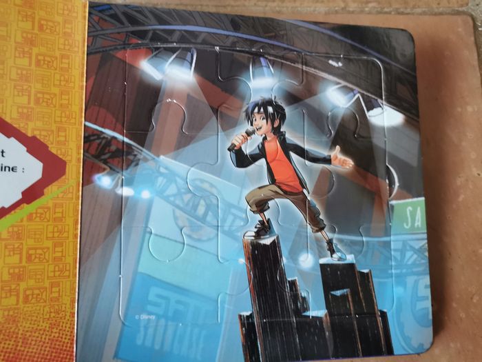 Les Nouveaux Héros, Disney. Mon petit livre puzzle - photo numéro 3