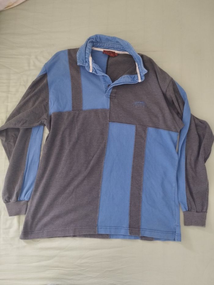 Polo homme status