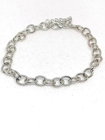 Bracelet grosses mailles argentée.