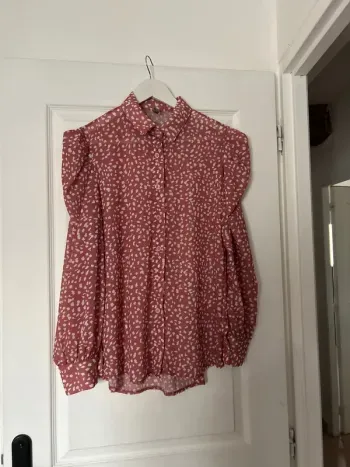 Blouse rose épaule bouffante