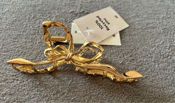 Pince à cheveux en forme de noeud doré H&M - photo numéro 2