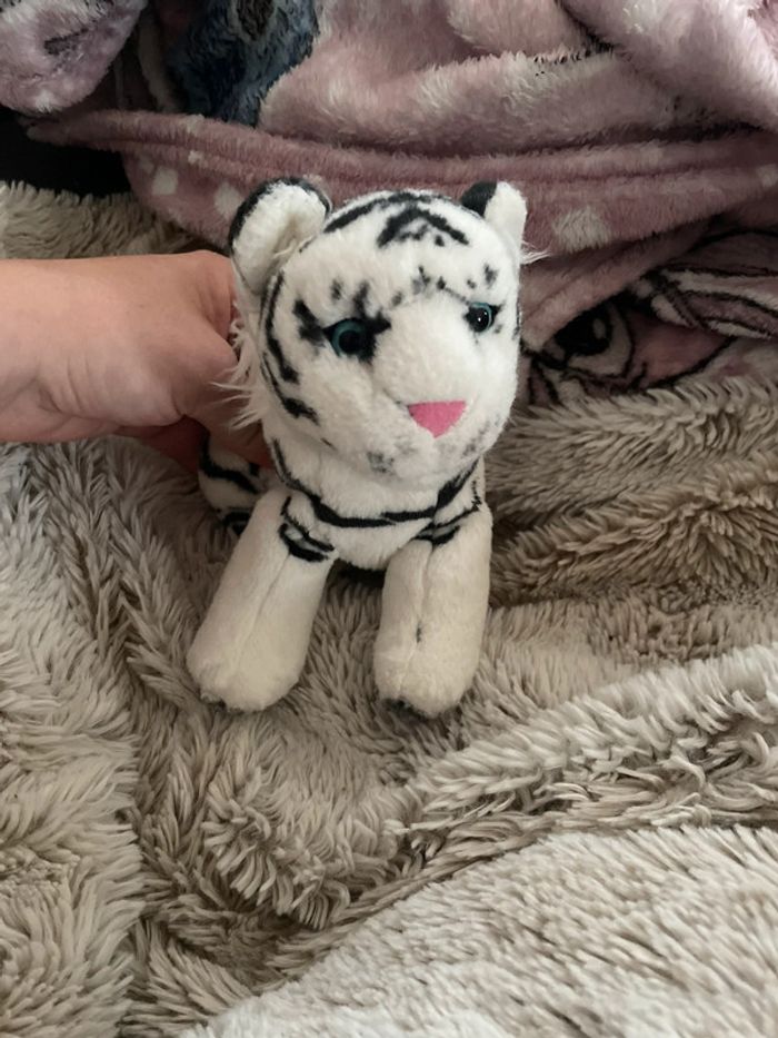 Peluche tigre blanc