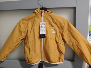 Impermeable 4 ans neuf