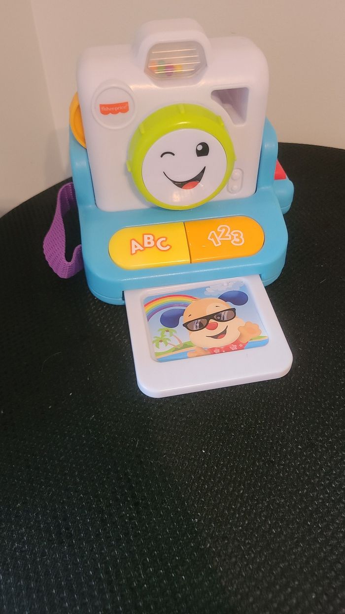Fisher-Price Rires et Éveil Mon Premier Appareil Photo instantané, Jouet Musical